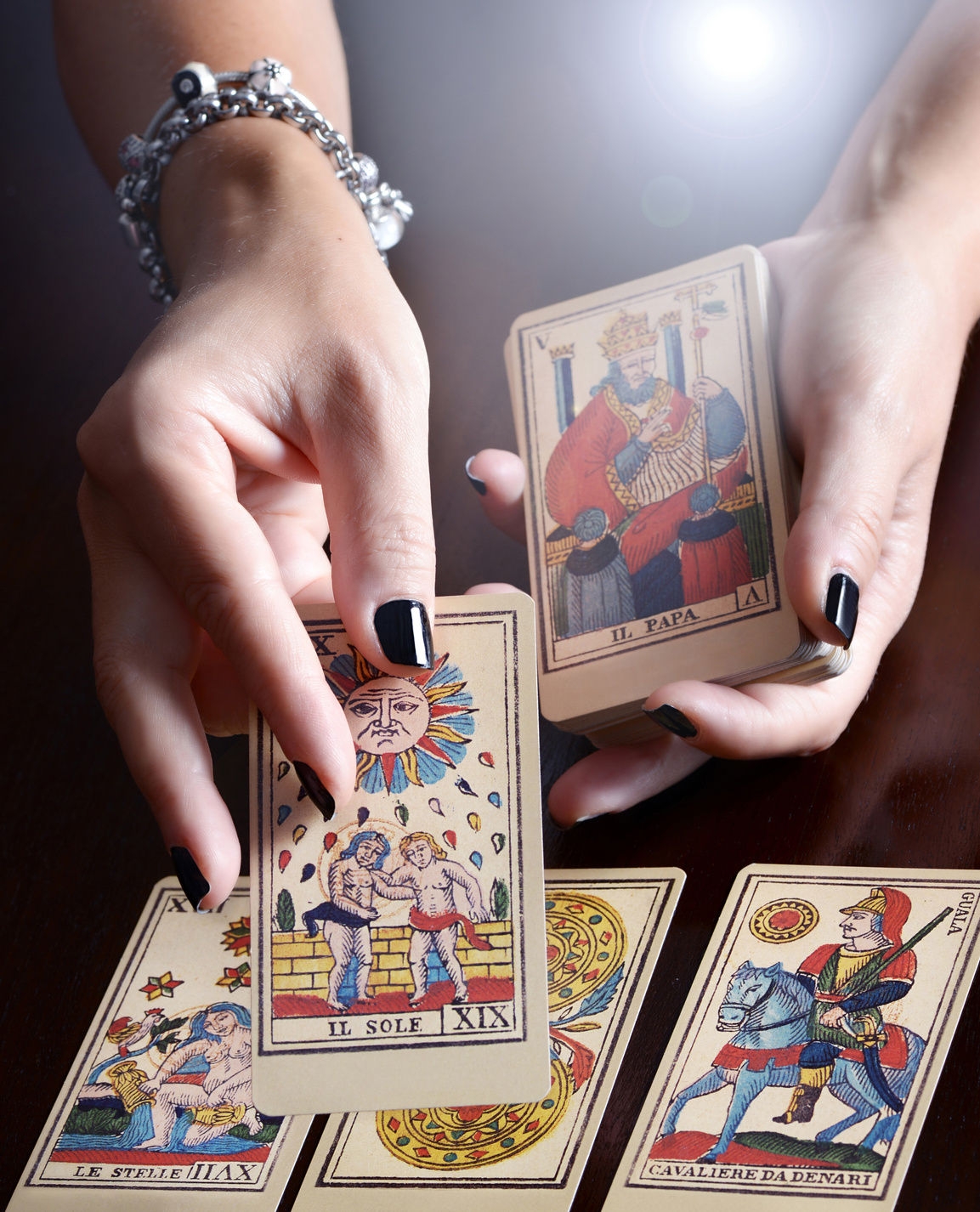Female Hands Performing Tarot Card Reading