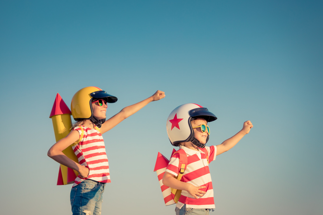 Happy Children Playing Outdoor in Summer